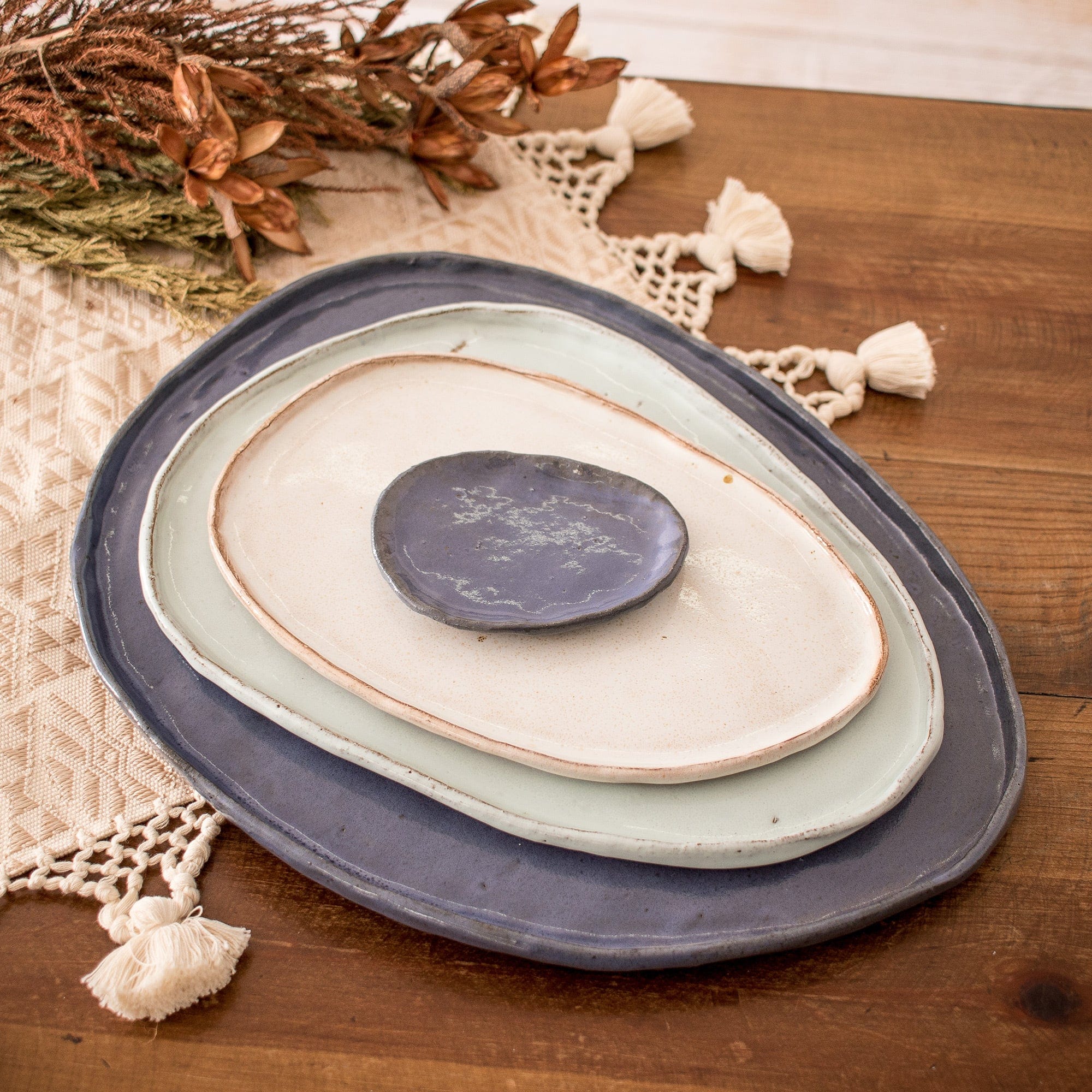 Set of 4 Handcrafted Blue and Ivory Ceramic Serving Plates - Versatility and Style